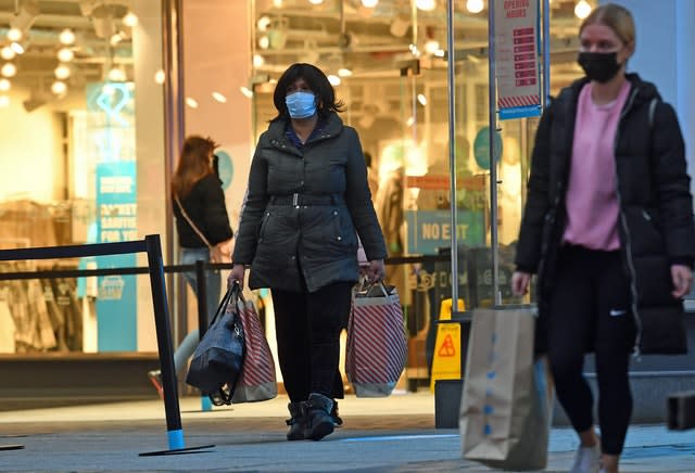 Shoppers leaving Primark in Birmingham (Jacob King/PA)