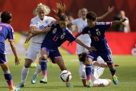 Jul 1, 2015; Edmonton, Alberta, CAN; Japan midfielder Rumi Utsugi (13) and defender Saori Ariyoshi (19) fight for the ball against England midfielder Katie Chapman (16) during the first half in the semifinals of the FIFA 2015 Women's World Cup at Commonwealth Stadium. Mandatory Credit: Erich Schlegel-USA TODAY Sports