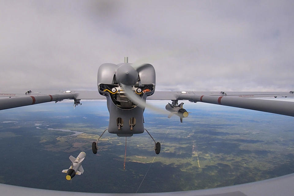 In this photo released by the Russian Defense Ministry Press Service, a Russian drone launches a missile during the Zapad-2021 war games by Russian and Belarusian forces at the Mulino training ground in the Nizhny Novgorod region, Russia, Saturday, Sept. 11, 2021. Ukrainian and Western officials are worried that a Russian military buildup near Ukraine could signal plans by Moscow to invade its ex-Soviet neighbor. The Kremlin insists it has no such intention and has accused Ukraine and its Western backers of making the claims to cover up their own allegedly aggressive designs. (Vadim Savitskiy/Russian Defense Ministry Press Service via AP, File)