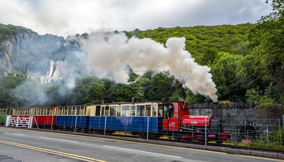 A steam train runs past the north-west Wales slate landscape following the announcement that it has been granted Unesco World Heritage Status (Peter Byrne/PA) (PA Wire)
