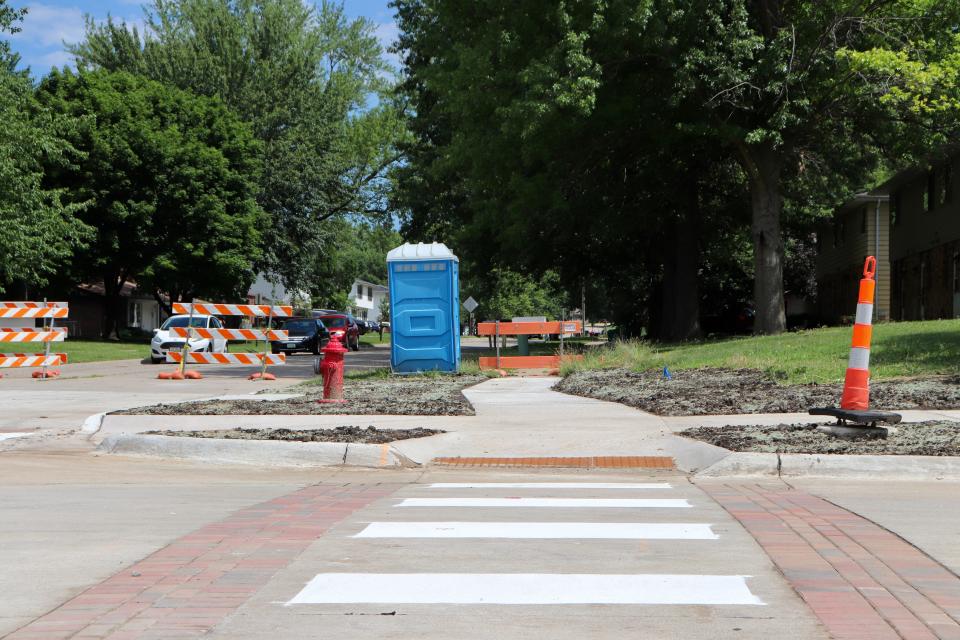Repainted crosswalks, completed as part of the first stage of the 5th Street Improvement project, will reopen to the public on June 27. The resurfaced and redesigned crosswalk is seen on Wednesday, June 26, 2024 in Coralville, Iowa.