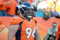 Mitch Unrein #96 of the Denver Broncos celebrates his touchdown during the game against the Tampa Bay Buccaneers at Sports Authority Field at Mile High on December 2, 2012 in Denver, Colorado. (Photo by Garrett W. Ellwood/Getty Images)