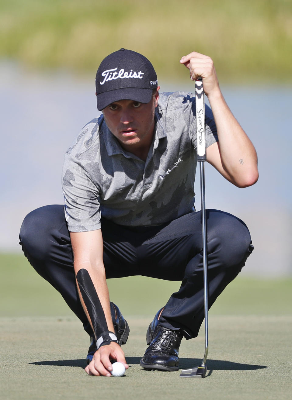 FILE - In this March 2, 2019, file photo, Justin Thomas lines up a putt on the eighth hole during the third round of the Honda Classic golf tournament, in Palm Beach Gardens, Fla. Major champion. FedEx Cup champion. And now Justin Thomas has another title. Matchmaker for Michelle Wie and Jonnie West. Wie, the golf prodigy from Hawaii and former U.S. Women's Open champion, revealed on Instagram earlier this week that she was engaged to West, the Golden State Warriors' director of basketball operations and the son of NBA great Jerry West. And it all started with an exchange of text messages. "They both asked me about each other," Thomas said. (AP Photo/Wilfredo Lee, File)