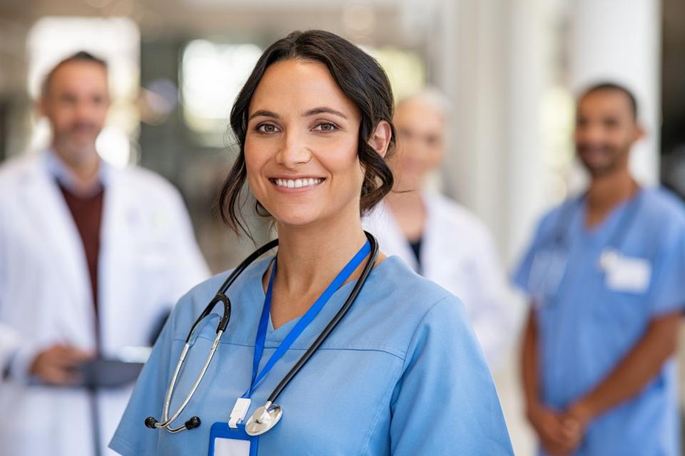 A smiling healthcare worker.