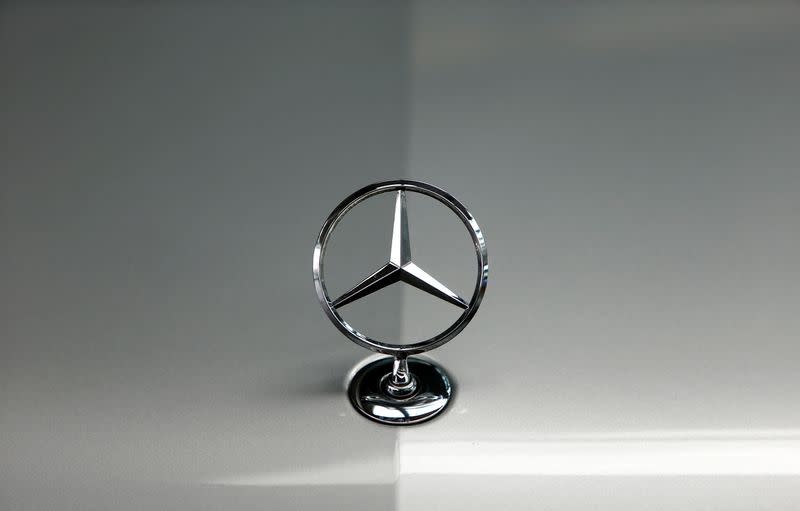 FILE PHOTO: Bonnet emblem of Mercedes-Benz car is pictured in dealership of German car manufacturer Daimler in Munich