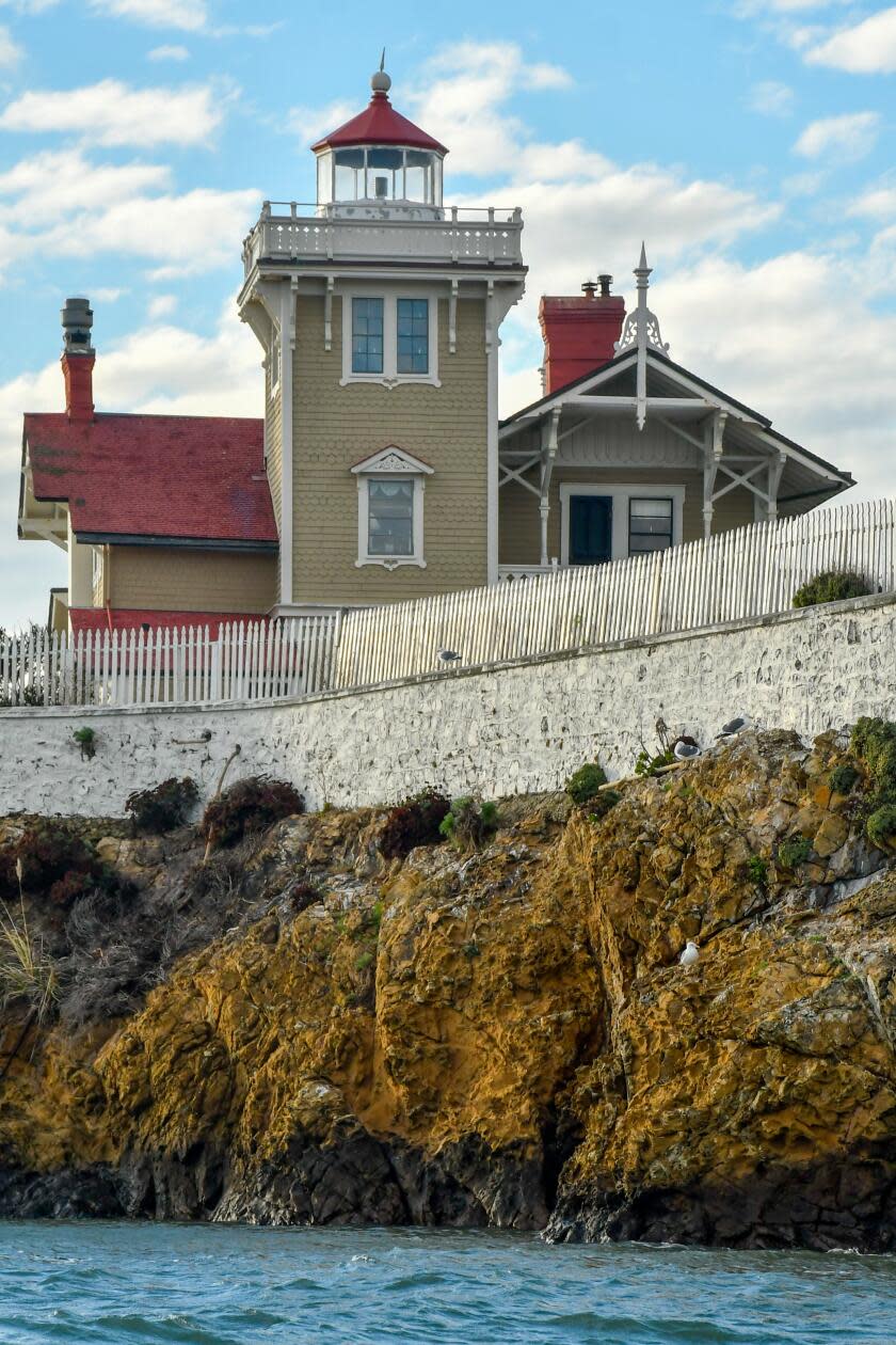 A Victorian-style lighthouse on an island