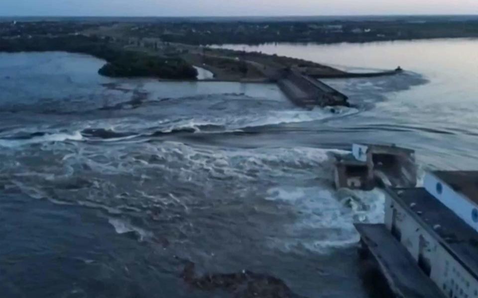 The Kakhovka hydroelectric power station dam partially destroyed on Tuesday morning - AFP