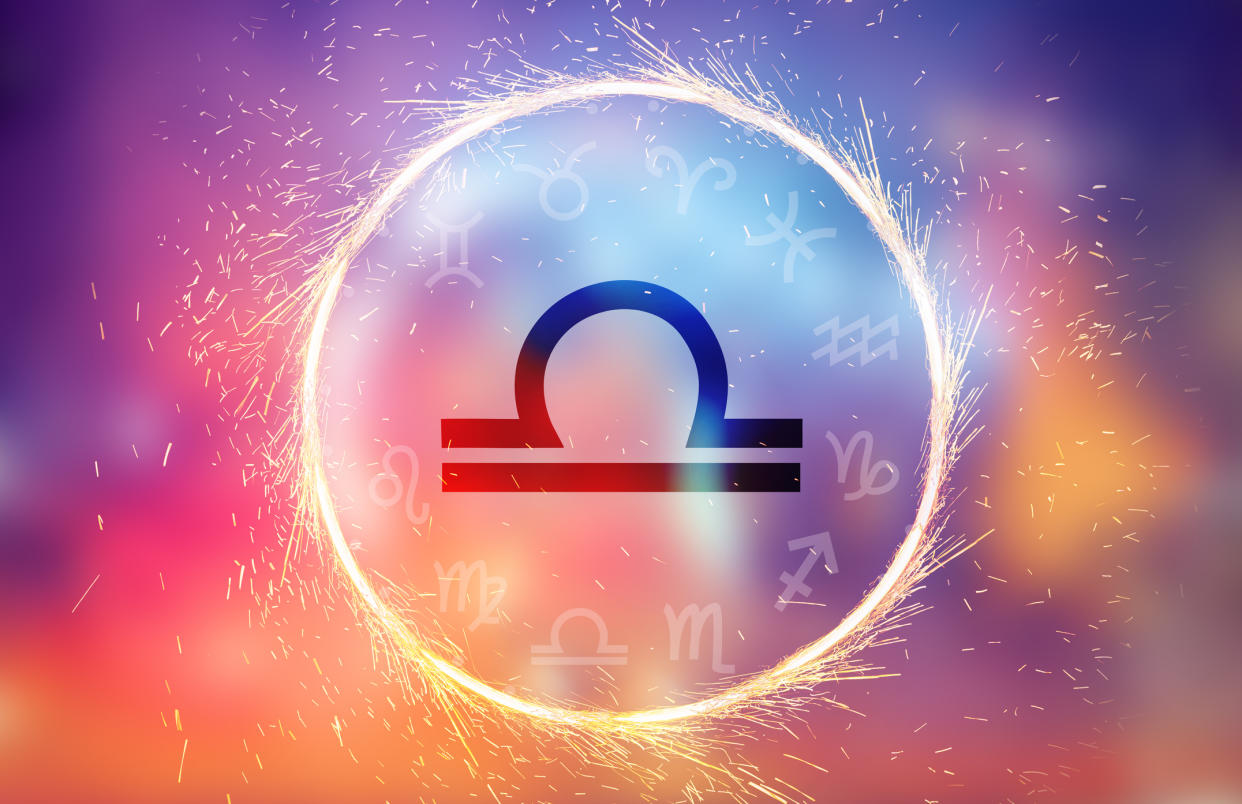 <b>Libra symbol on a colorful background light</b> sarayut Thaneerat / Getty Images