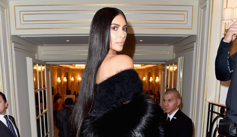 Kim Kardashian flaunts lip ring at Kris Jenner's Christmas party