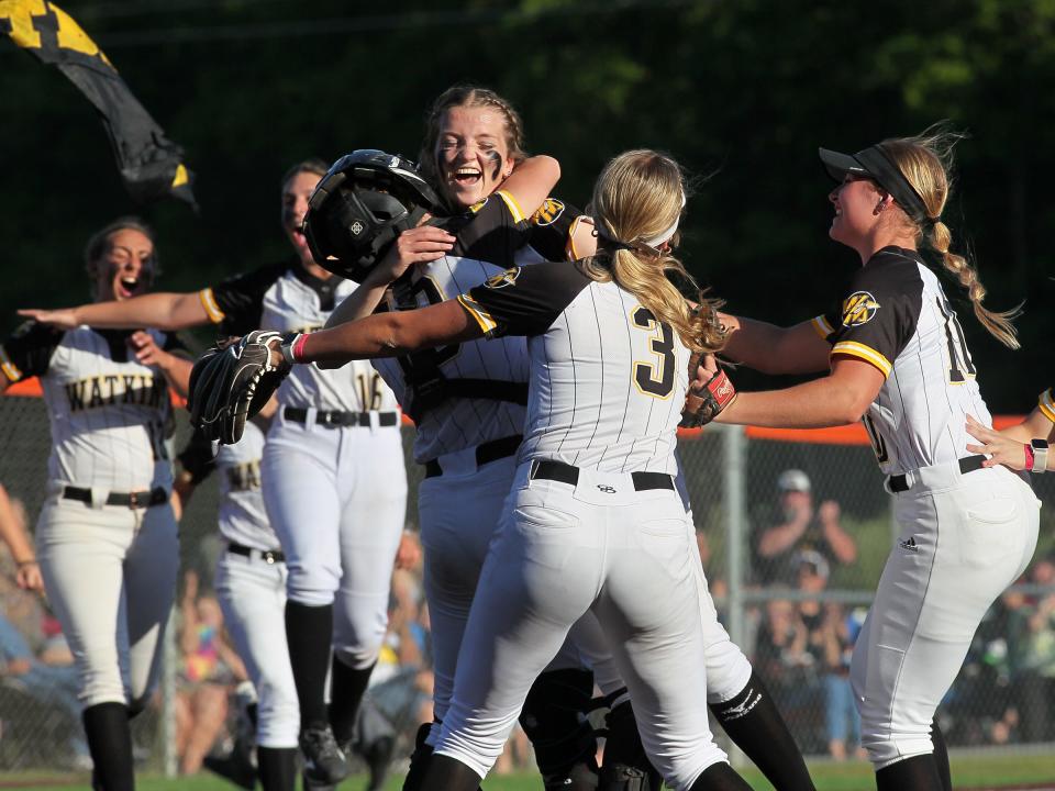 Watkins Memorial pitcher Carsyn Cassady celebrates with teammates after the team's 6-0 victory against Marysville on Friday, May 26, 2023, to clinch the team's third consecutive Division I regional title. 