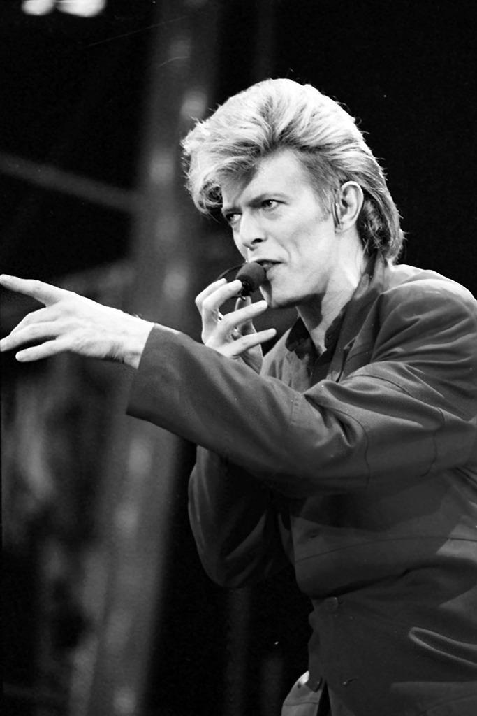 Bowie predicts the soon-to-approach pared-down style of the ‘90s as he performs at Wembley Stadium, London on June 20, 1987, on his Glass Spider tour to promote his album ‘Never Let Me Down.’