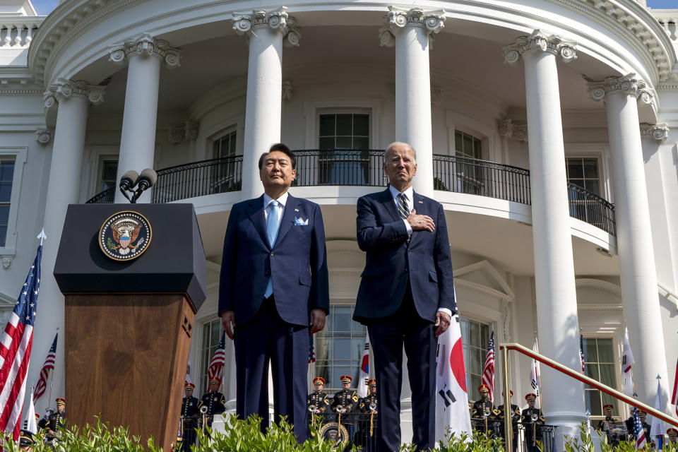 President Joe Biden and South Korea's President Yoon Suk Yeol stand as their two country's national anthems are played during a State Arrival Ceremony on the South Lawn of the White House in Washington, Washington, Wednesday, April 26, 2023. (AP Photo/Andrew Harnik)