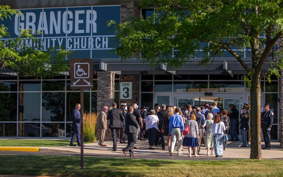 Family follows as the late U.S. Rep. Jackie Walorski is carried in ahead of the public visitation on Wednesday, Aug. 10, 2022 at Granger Community Church. 