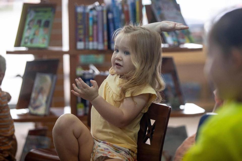 Annalise Talley, 2, of Lexington, attends story time at the Lexington Public Library’s Village Branch temporary location off Alexandria Drive in Lexington, Ky.