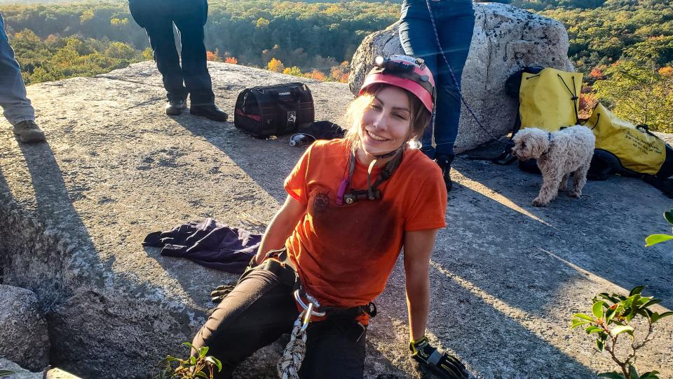 Jessica Van Ord, a rescuer with the New Jersey Initial Response Team, smiles after she was able to slide into a crevice to rescue a 12-year-old dog, Liza, near Gertrude’s Nose Trail in Minnewaska State Park Preserve in Ulster County on Tuesday, Oct. 12, 2021.