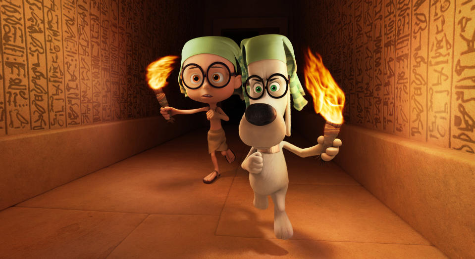 This image released by DreamWorks Animation shows Sherman, voiced by Max Charles, left, and Mr. Peabody, voiced by Ty Burell, in a scene from "Mr Peabody & Sherman." (AP Photo/ DreamWorks Animation)