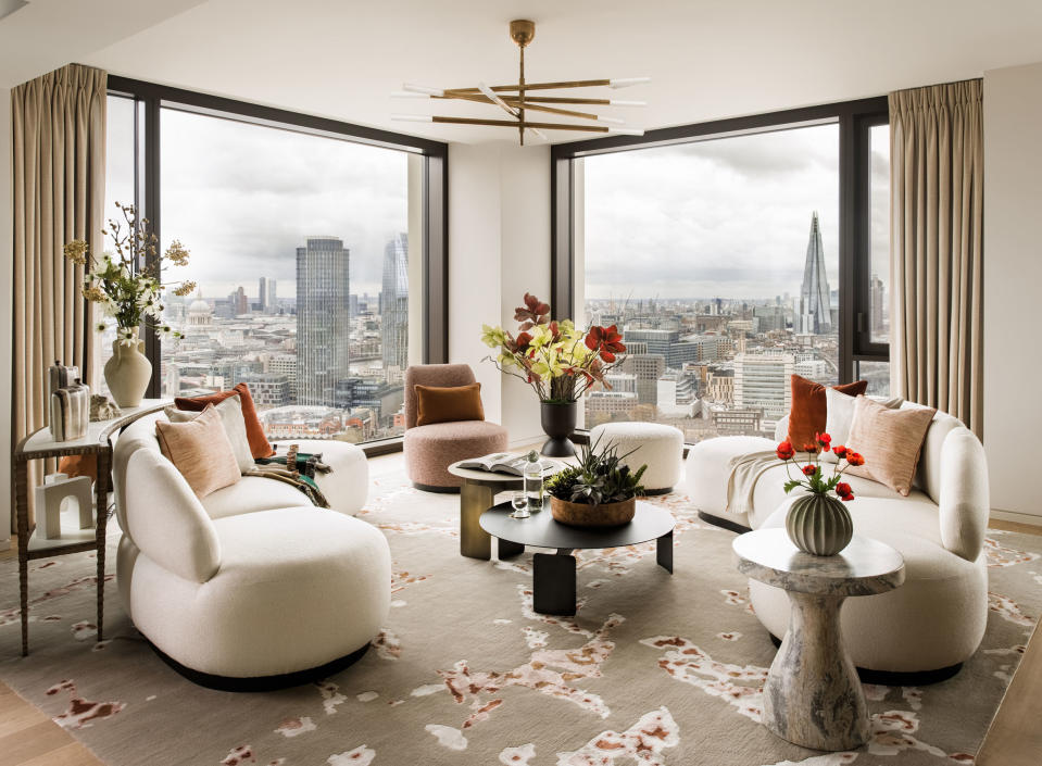 <p> This is particularly important for your apartment living room. Here, in this London apartment designed by Elicyon, apartment layout very much prioritizes the view of the skyline beyond. </p> <p> 'The clever placement of the furniture is far from traditional, but it does focus attention on what's beyond it: a world class view,' says Lucy Searle, Editor in Chief of <em>Homes & Gardens</em>. 'The choice of curved furniture makes the angle of they're placed at much subtler and softer, and of course makes an open-plan space feel more sociable and inviting.' </p>