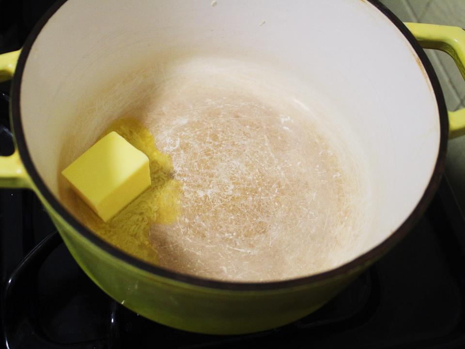 butter melting in a pot on the stove