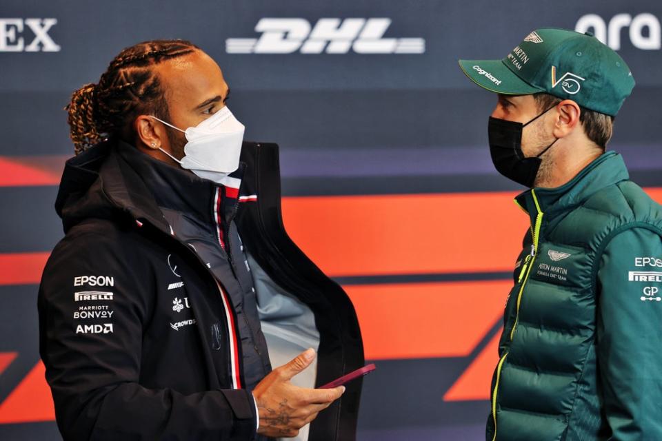 Lewis Hamilton and Sebastian Vettel talk at the Autodromo Enzo e Dino Ferrari (Getty)