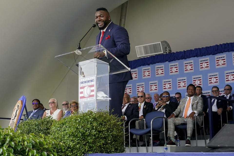 Hall of Fame inductee David Ortiz, formerly of the Boston Red Sox baseball team, speaks during the National Baseball Hall of Fame induction ceremony, Sunday, July 24, 2022, in Cooperstown, N.Y. (AP Photo/John Minchillo)