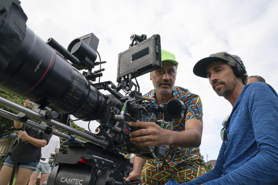 This image released by Searchlight Pictures shows filmmaker Taika Waititi, center, on the set of "Next Goal Wins," which will have its world premiere at the Toronto International Film Festival this fall. (Hilary Bronwyn Gayle/Searchlight Pictures via AP)