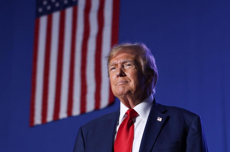 PHOTO: Former President Donald Trump greets the crowd at a campaign rally, Dec. 16, 2023, in Durham, N.H.  (Reba Saldanha/AP)