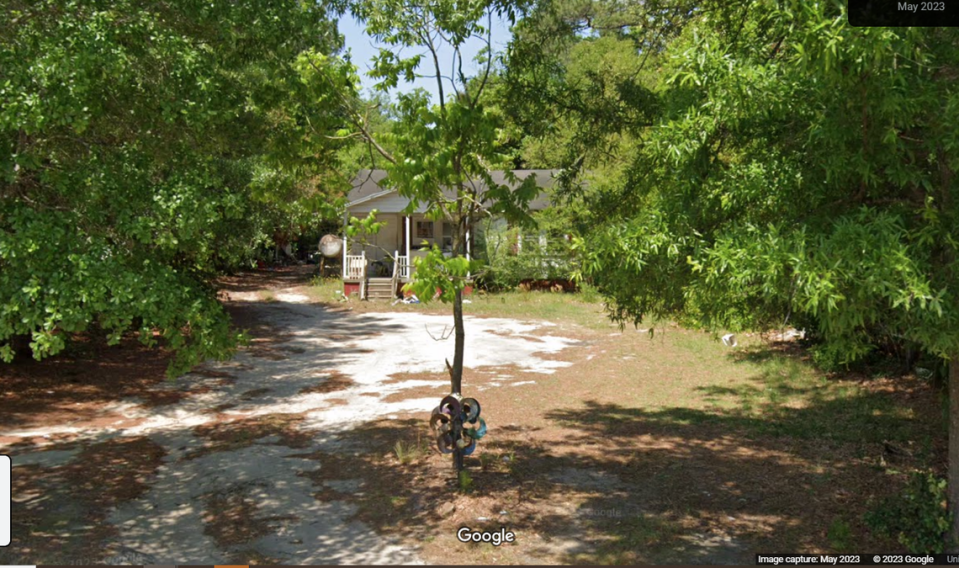 Five bodies were found Oct. 26 in this home outside Clinton, North Carolina, according to the Sampson County Sheriff’s Office. Street View image from May 2023. © 2023 Google