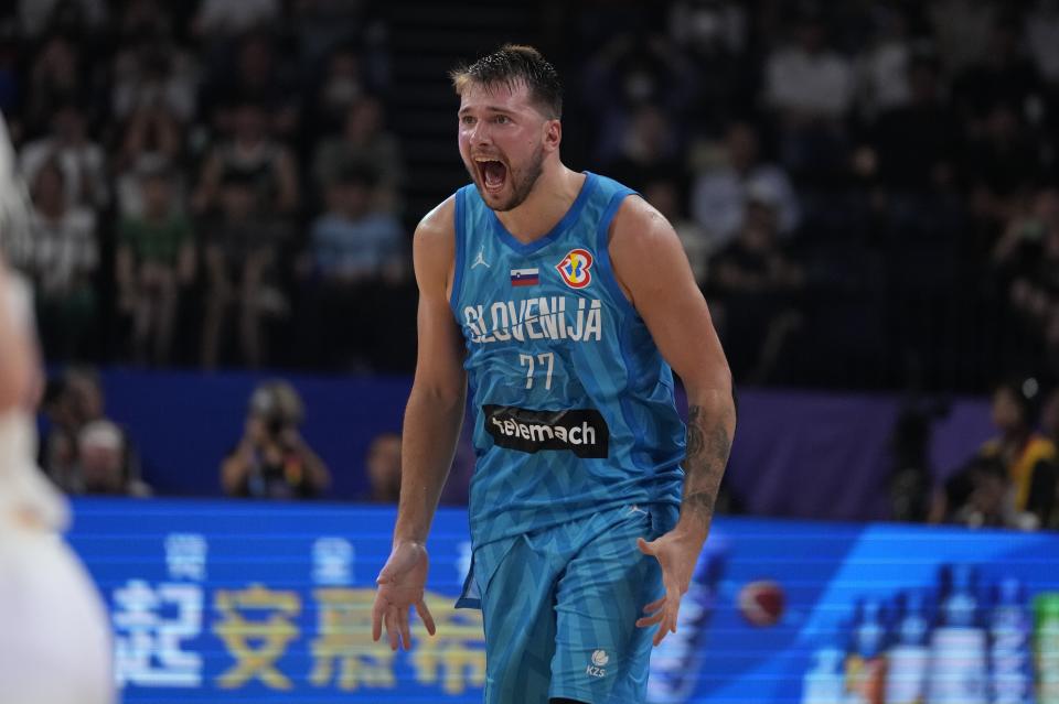 Slovenia guard Luka Doncic (77) reacts after making a failing shot against Germany in the first half of their Basketball World Cup group K match in Okinawa, southern Japan, Sunday, Sept. 3, 2023. (AP Photo/Hiro Komae)