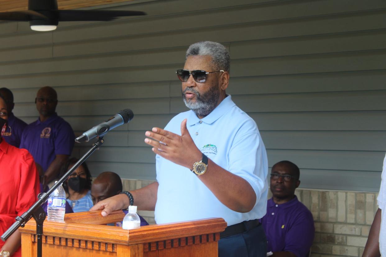 Gastonia Mayor Walker Reid speaks at a ceremony for the opening of the Omegas of Gastonia Community Resource Center on North Highland Street. The home represents the first for the Epsilon Upsilon Chapter of Omega Psi Phi Fraternity Inc. in Gastonia in its 72 years of existence.