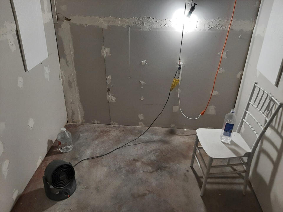 FILE - This undated photo provided by the Federal Bureau of Investigation's Portland Field Office shows the interior of a makeshift cinderblock cell in Klamath Falls, Ore., allegedly used by Negasi Zuberi. Zuberi, the man arrested in July 2023 for allegedly kidnapping a woman in Seattle, driving her hundreds of miles to his home in Klamath Falls and locking her in the makeshift cinder block cell, is facing fresh charges in a new, separate state case against him, court documents show. A grand jury in southern Oregon’s Klamath County indicted Zuberi on 11 counts, including first-degree rape, sexual abuse and kidnapping, on Sept. 11, 2023. (FBI via AP, File)
