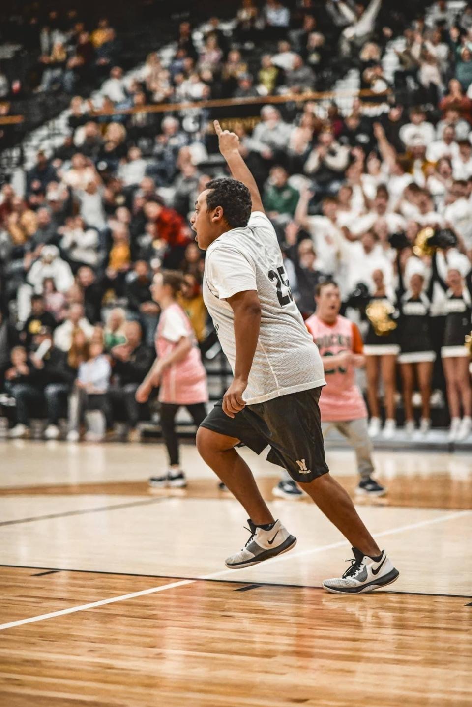 Noblesville's Mo Ashour celebrates a made basket during Noblesville's Unified game against Westfield.