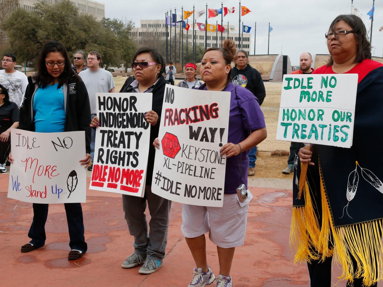 Native Americans demonstrate for Indigenous Rights at a rally at the state Capitol in Oklahoma City, Thursday, Jan. 24, 2013.