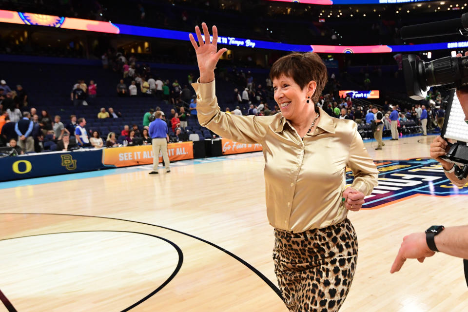 Muffet McGraw runs off the court at the Final Four.