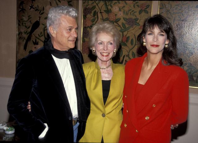 Tony Curtis, Janet Leigh, and Jamie Lee Curtis standing next to each other