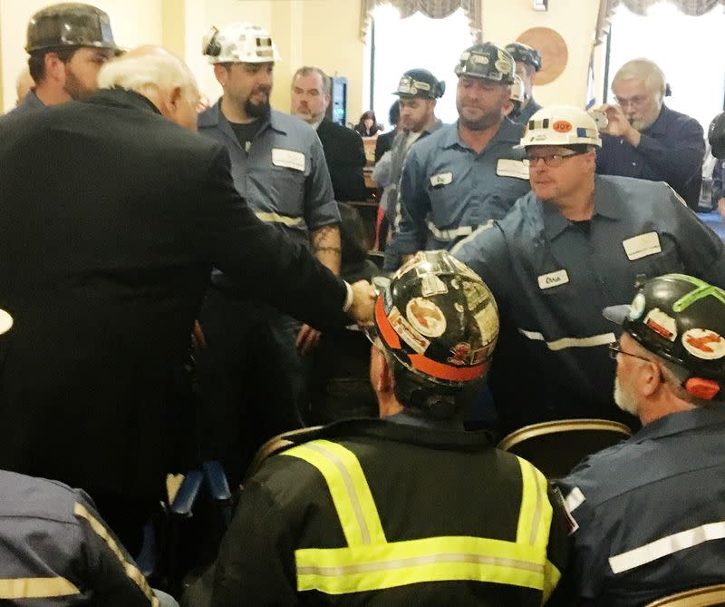 FILE PHOTO: Robert Murray, founder and CEO of Murray Energy greets coal miners at the EPA hearing in Charleston