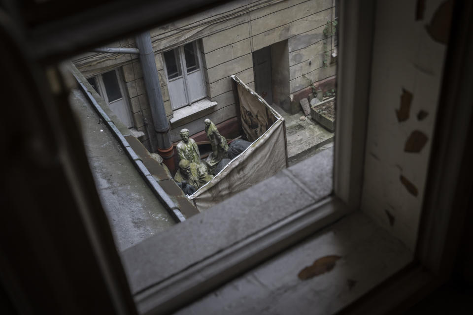 Lenin sculptures are placed on the patio of the Andrey Sheptytsky National Museum in Lviv, western Ukraine, Friday, March 4, 2022. The doors of the museum have been closed since Russia’s war on Ukraine began on Feb. 24, and heritage sites across the country face danger as the fighting continues. (AP Photo/Bernat Armangue)