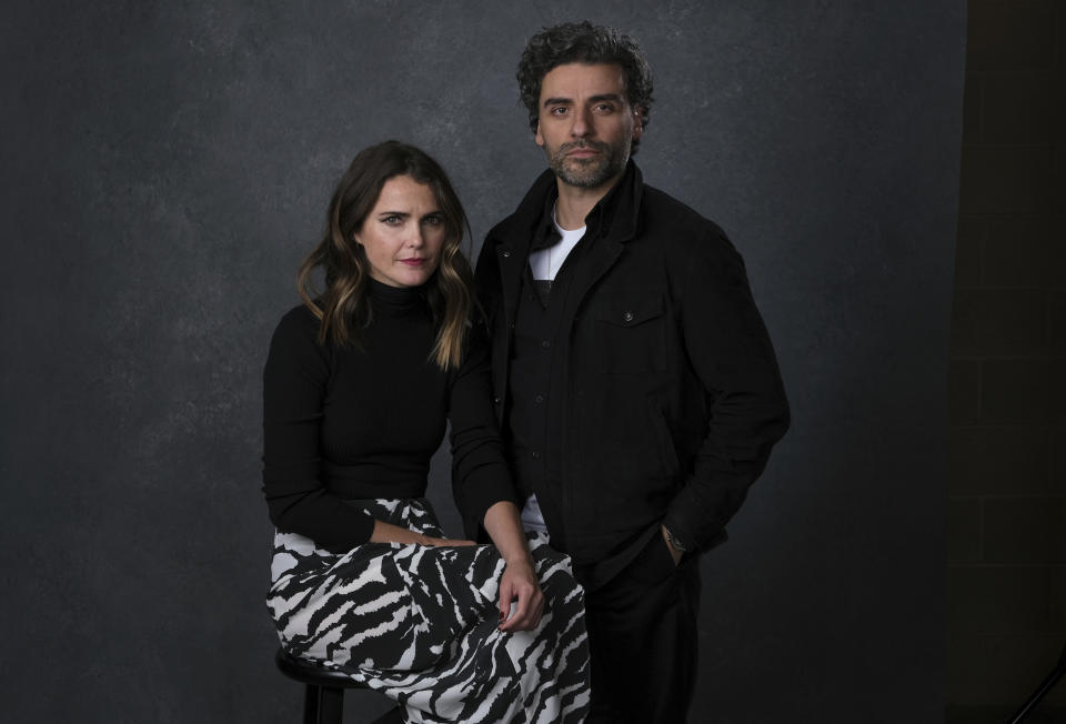 This Dec. 3, 2019 photo shows Keri Russell, left, and Oscar Isaac posing for a portrait to promote their film "Star Wars: The Rise of Skywalker" in Pasadena, Calif. (AP Photo/Chris Pizzello)