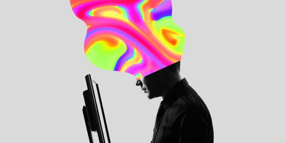 A person staring at a computer, with a psychedelic pattern coming from their head.
