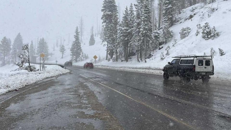 Slick conditions are seen on Highway 50 in El Dorado County on Friday. Caltrans officials advised motorists to avoid mountain travel through Monday if possible due to the threat of heavy snow. As much as 4 feet is possible in the High Sierra east of Sacramento through the weekend.