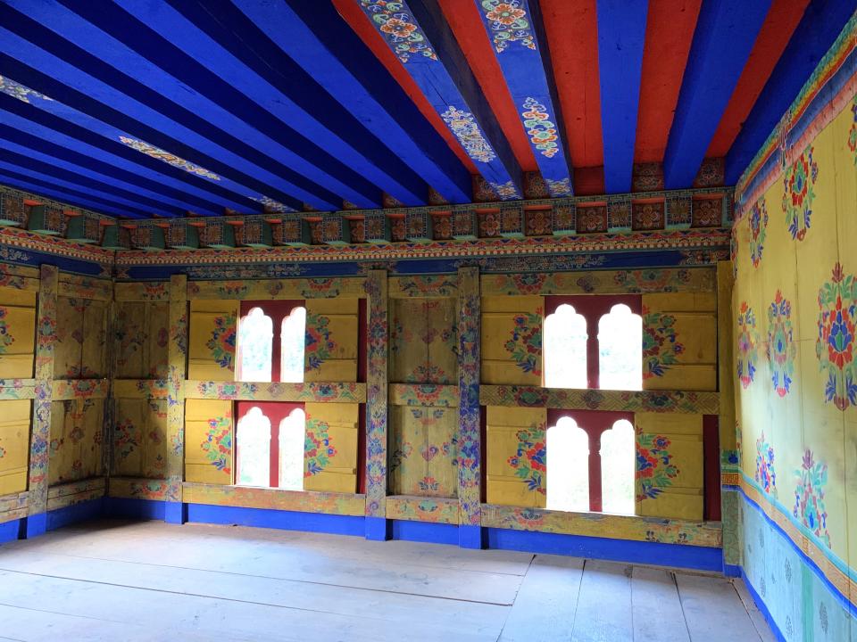 The interior of the Queen's Chamber. In addition to replicating the interior and exterior paint, the restoration included restoring the rooms' wood floors.