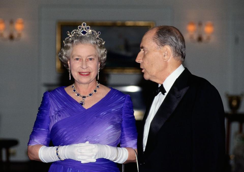 queen elizabeth ii with president mitterrand at a banquet on