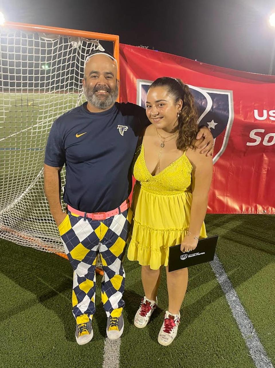 Valentina Erigoyen of Palmer Trinity School, pictured with Coach Jose Herrera, won the Jackie Pitts Award for the Florida-South Atlantic area, presented by USA Lacrosse. Photo Courtesy Palmer Trinity Lacrosse