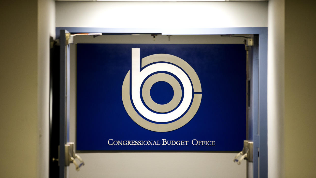 A sign identifies the offices of the nonpartisan Congressional Budget Office (CBO), which will soon release the projected cost and effect of the Republican bill, called the American Health Care Act, to replace Obamacare in the Ford House Office Building in Washington, DC, USA, 13 March 2017.