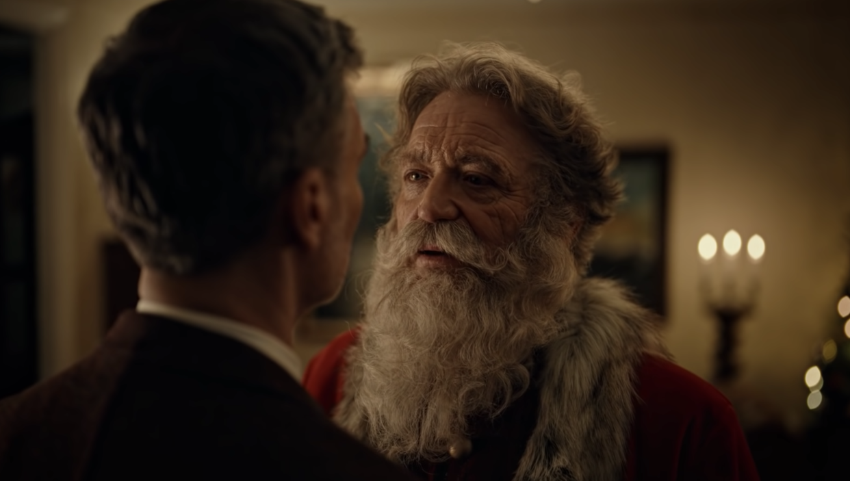 A new ad for the Norweigan postal service, Posten, depicts a man falling in love with Santa Claus. (Photo: YouTube)
