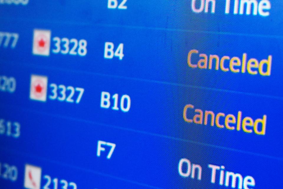 United Airlines flight information screen displays today flight information, including canceled flights at O'Hare International Airport in Chicago, Sunday, Jan. 14, 2024. Over 70 flight cancellations at Chicago airports Sunday. (AP Photo/Nam Y. Huh)