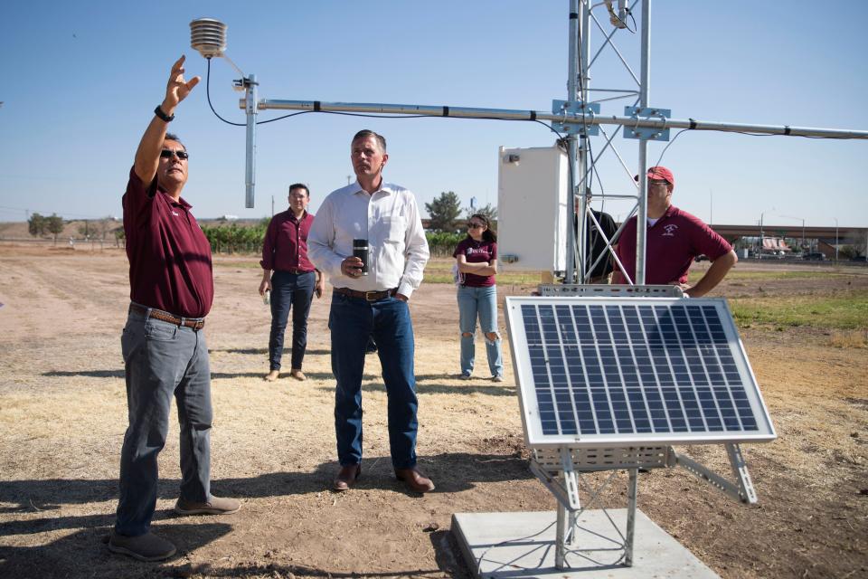 New Mexico state climatologist Dr. Dave Dubois explains the mechanics of the ZiaMet weather stations U.S. Senator Martin Heinrich (D-N.M.) at Fabian Garcia Research Center on Thursday, June 2, 2022. 