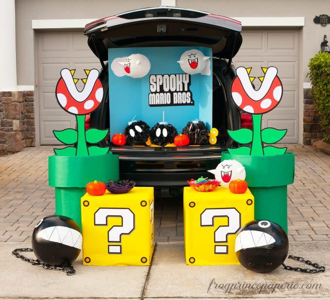 <p>Excuse me, that's <em>Spooky</em> Mario Bros. For this video game scene, paper lanterns became ghosts and tissue poofs became the bombs. </p><p><a href="https://frogprincepaperie.com/mario-brothers-trunk-or-treat-ideas/" rel="nofollow noopener" target="_blank" data-ylk="slk:See more at Frog Prince Paperie »;elm:context_link;itc:0;sec:content-canvas" class="link "><em>See more at Frog Prince Paperie »</em></a></p><p><strong>RELATED:</strong> <a href="https://www.goodhousekeeping.com/holidays/halloween-ideas/g2618/halloween-games/" rel="nofollow noopener" target="_blank" data-ylk="slk:Fun Halloween Games for Kids to Play at Their Halloween Party;elm:context_link;itc:0;sec:content-canvas" class="link ">Fun Halloween Games for Kids to Play at Their Halloween Party</a></p>