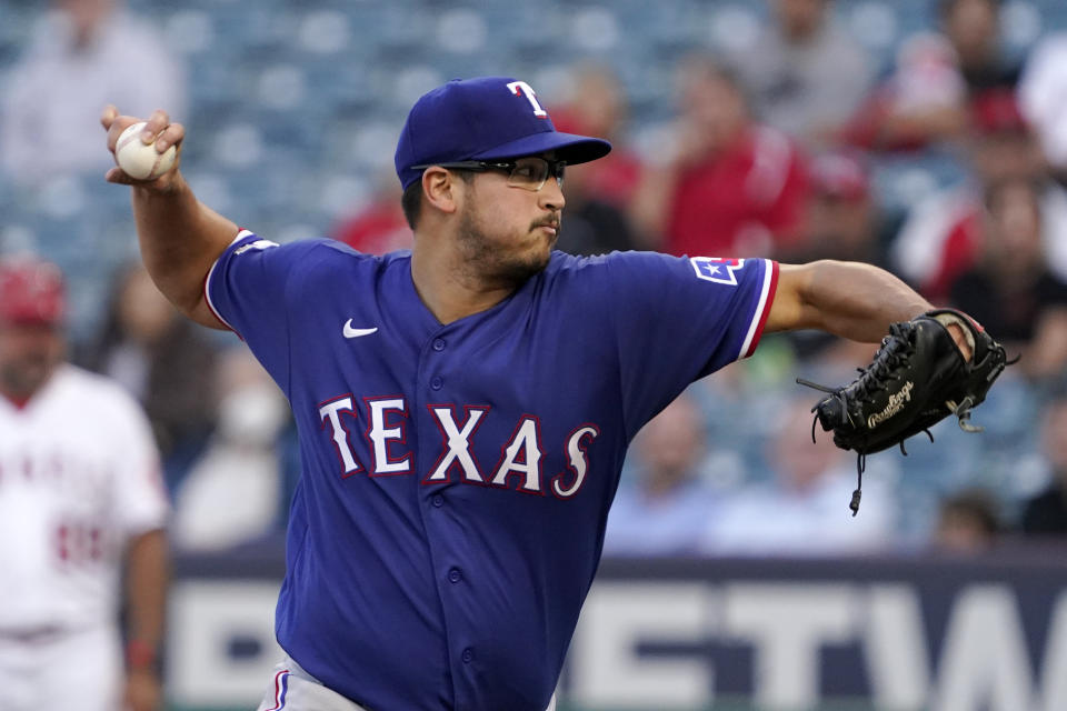 Texas Rangers starting pitcher Dane Dunning throws to the plate during the first inning of a baseball game against the Los Angeles Angels Tuesday, May 24, 2022, in Anaheim, Calif. (AP Photo/Mark J. Terrill)