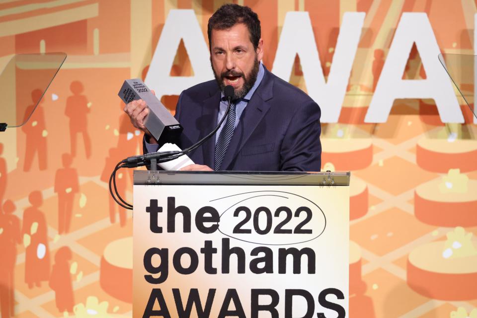 &quot;Hustle&quot; star Adam Sandler accepts the Film Tribute Award during the 2022 Gotham Awards in New York Monday.