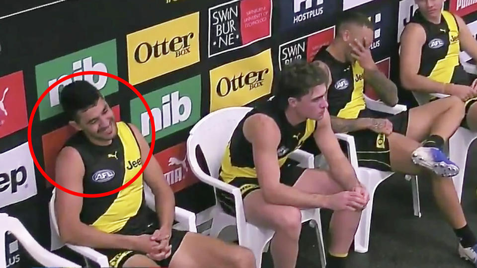 Marlion Pickett is pictured laughing in the Richmond rooms after last week's loss to Hawthorn.